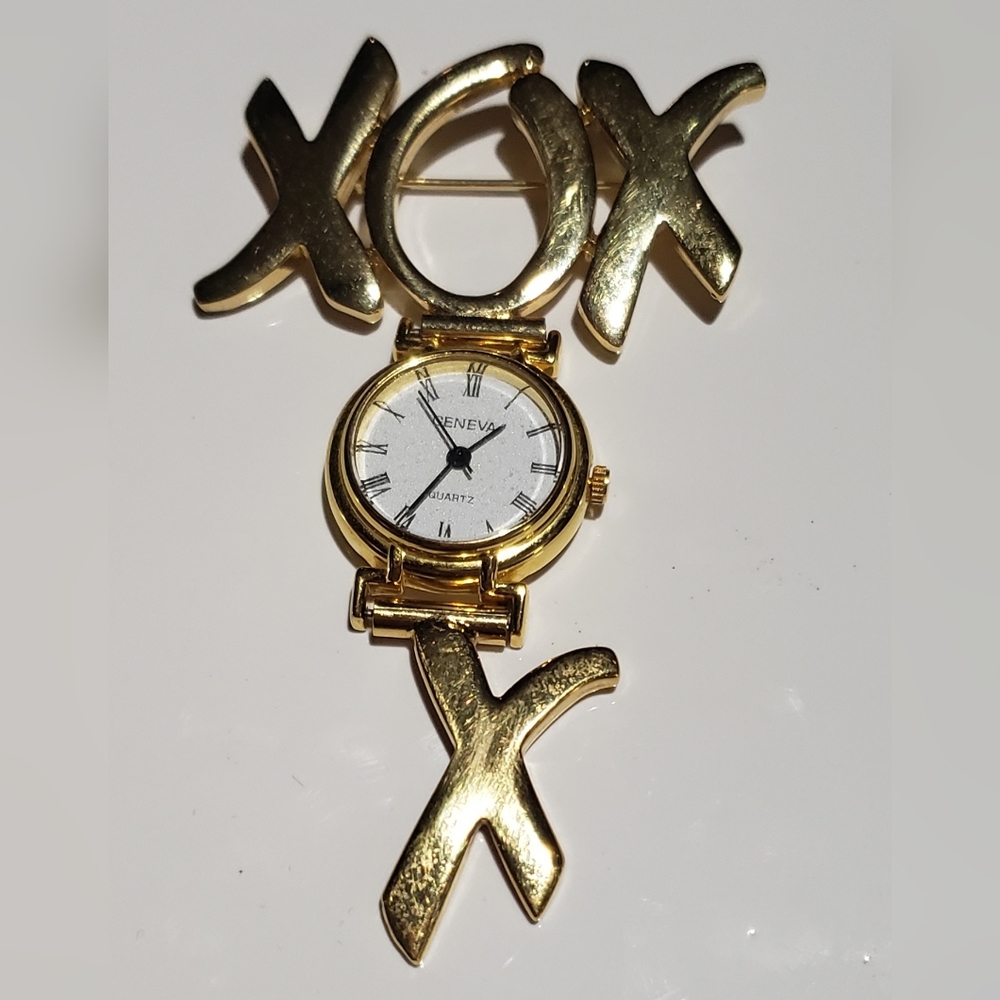 Rare vintage AJF Brooch with a Geneva watch.